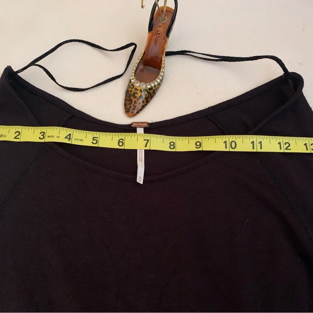 FREE PEOPLE ladies 95% rayon black “To the Tropics” size medium, long sleeve top